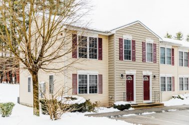Manchester residential townhome community with unfinished basement, washer/dryer hookups, private patio and assigned off-street parking.