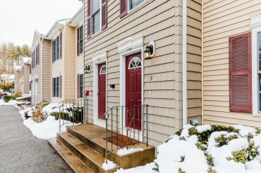 Manchester residential townhome community with unfinished basement, washer/dryer hookups, private patio and assigned off-street parking.